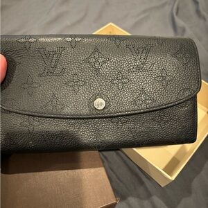 Brand new authentic Louis Vuitton long snap wallet